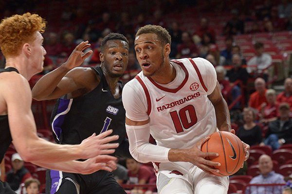 Arkansas Southwest Baptist Friday, Nov. 2, 2018, during the first half of their exhibition game in Bud Walton Arena. Visit nwadg.com/photos to see more photographs from the game.