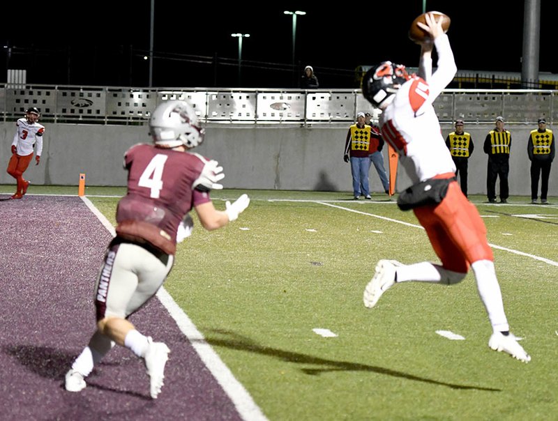 Bud Sullins/Special to Siloam Sunday Russellville safety Johnny Bucher, right, steps in front of Siloam Springs senior Spenser Pippin for an interception to snuff out a potential Panthers scoring drive on Friday at Panther Stadium. The Cyclones rallied from a 10-0 deficit to come back and beat the Panthers 30-16.