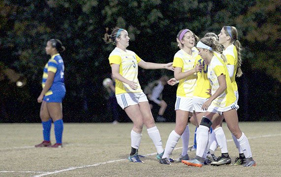 Photo courtesy of JBU Sports Information The John Brown University women's soccer team celebrates after scoring a goal Friday against Central Christian (Kan.) at Alumni Field in the opening round of the Sooner Athletic Conference women's soccer tournament.