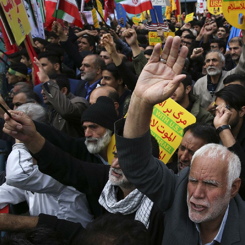 Demonstrators in Tehran, Iran, chant Sunday during an annual rally in front of the former U.S. Embassy to mark the 39th anniversary of the seizure of the embassy by militant Iranian students. 