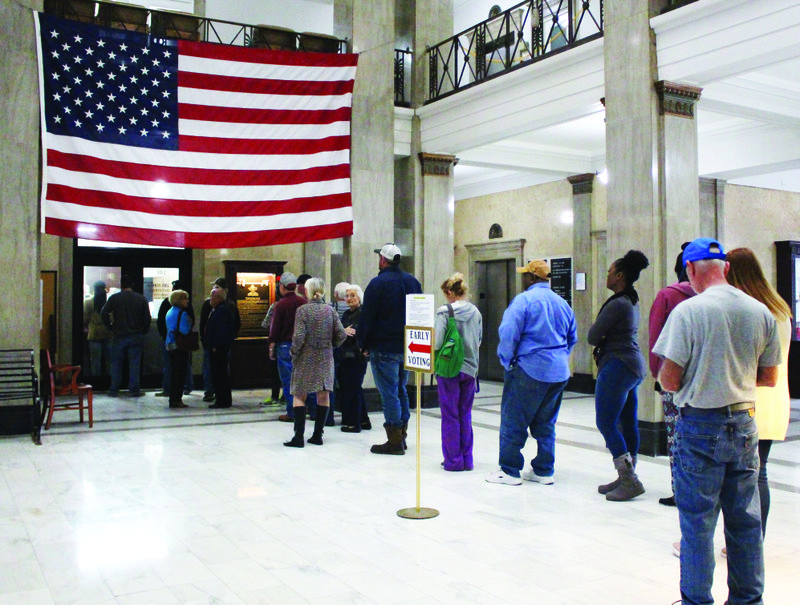 Early voting: Union County residents stand in line to cast their ballots Monday on the last day of early voting. Early voting began Oct. 22 and ended yesterday at the County Clerk’s office inside the Union County Courthouse. Today, voters may cast their ballots at their designated polling site.