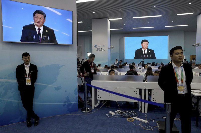 Chinese President Xi Jinping is seen on a live broadcast Monday during the opening ceremony for the China International Import Expo in Shanghai.