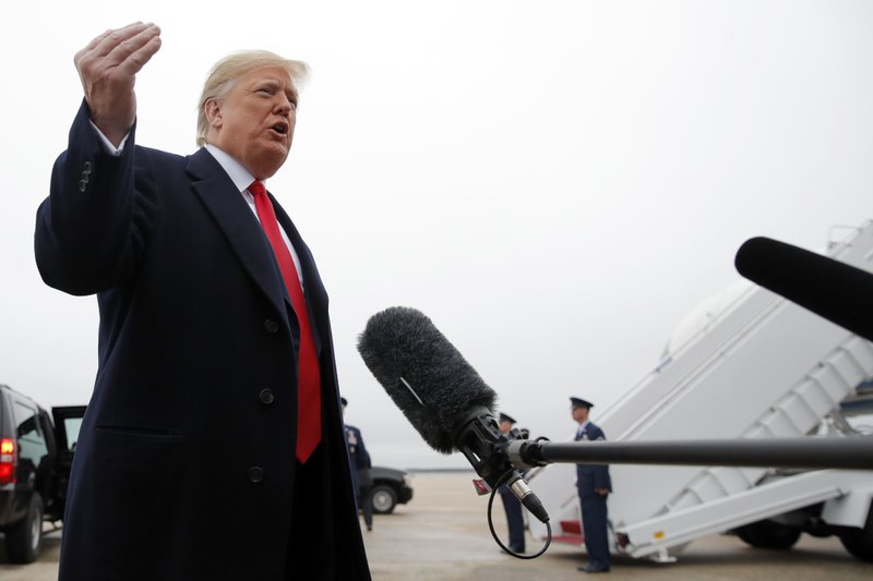 President Donald Trump speaks to the media before boarding Air Force One, Monday, Nov. 5, 2018, in Andrews Air Force Base, Md. Trump is traveling to three campaign rallies. (AP Photo/Carolyn Kaster)