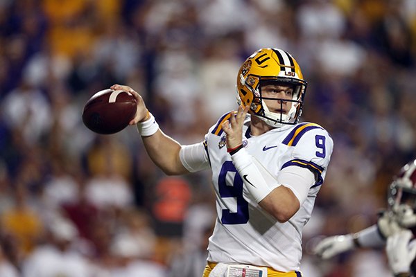 LSU quarterback Joe Burrow (9) passes in the first half of an NCAA college football game against Alabama in Baton Rouge, La., Saturday, Nov. 3, 2018. (AP Photo/Gerald Herbert)

