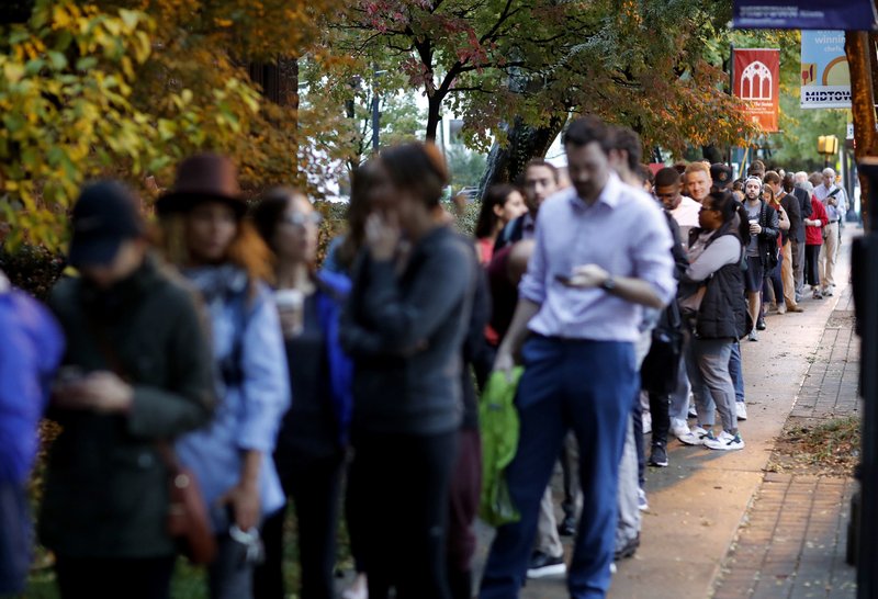 A line forms outside a polling site on election day in Atlanta, Tuesday, Nov. 6, 2018. (AP Photo/David Goldman)

