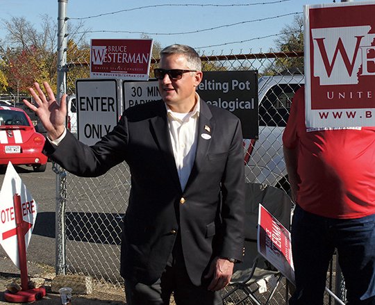 The Sentinel-Record/Richard Rasmussen CAMPAIGN TRAIL: U.S. Rep. Bruce Westerman, R-District 4, campaigns Tuesday outside the Garland County Election Commission Building on Ouachita Avenue.