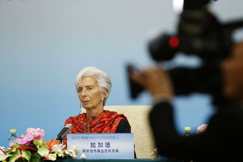 International Monetary Fund Managing Director Christine Lagarde, speaking Tuesday at a news briefing in Beijing, said her organization predicts slowing growth in China next year. 