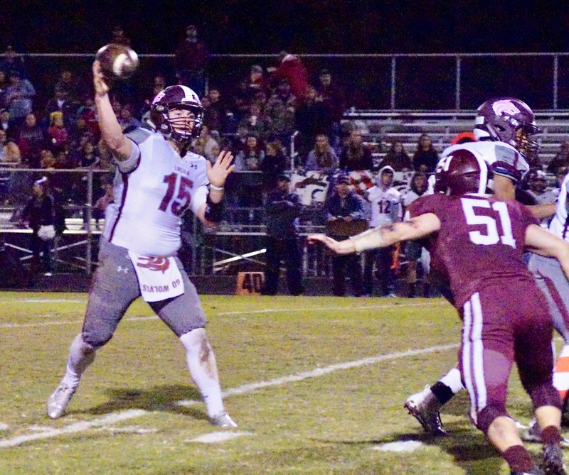 Westside Eagle Observer RANDY MOLL Lincoln senior quarterback Caleb Lloyd attempts to connect with a receiver during play in Pioneer Stadium against Gentry High School on Friday, Oct. 26, 2018. Lincoln won 38-13. The Wolves take on Hamburg in a road playoff game this Friday at 7 p.m.