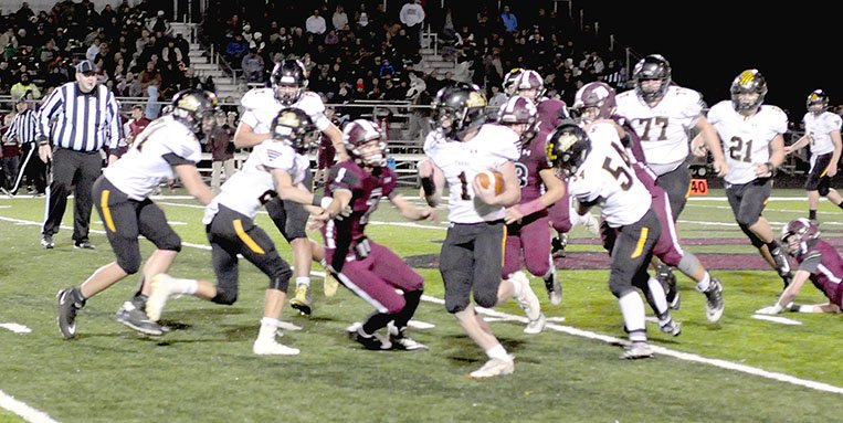 MARK HUMPHREY ENTERPRISE-LEADER/Prairie Grove sophomore Cade Grant (No. 1) breaks a 45-yard touchdown run that helped the Tigers surge ahead, 28-20, in the second quarter Friday. Lincoln rallied in the second half and won 59-48 to break a 19-game losing streak to the Tigers.