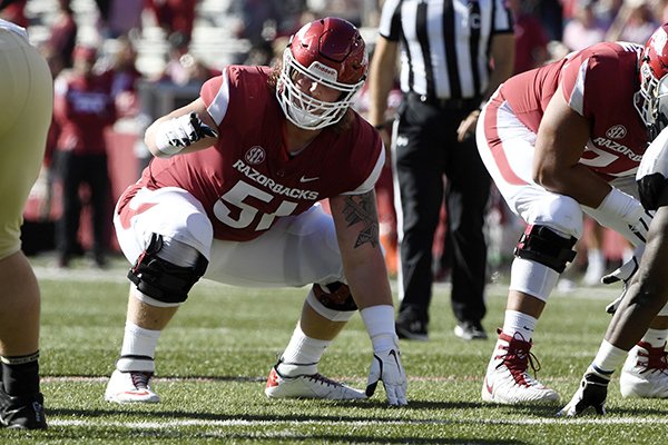 Arkansas offensive linemen Hjalte Froholdt gets ready to run a play against Vanderbilt in the first half of an NCAA college football game Saturday, Oct. 27, 2018, in Fayetteville, Ark. (AP Photo/Michael Woods)

