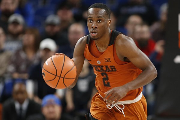 Texas' Matt Coleman during an NCAA college basketball game during the Phil Knight Invitational tournament in Portland, Ore., Thursday, Nov. 23, 2017. (AP Photo/Timothy J. Gonzalez)

