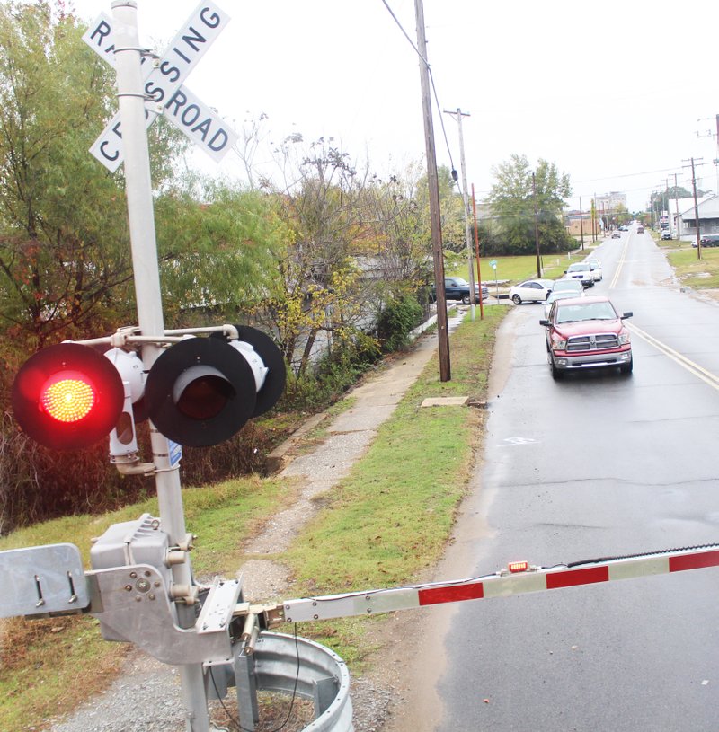 Train safety: Drivers stop at a railroad crossing Wednesday, waiting for a Union Pacific train to pass.