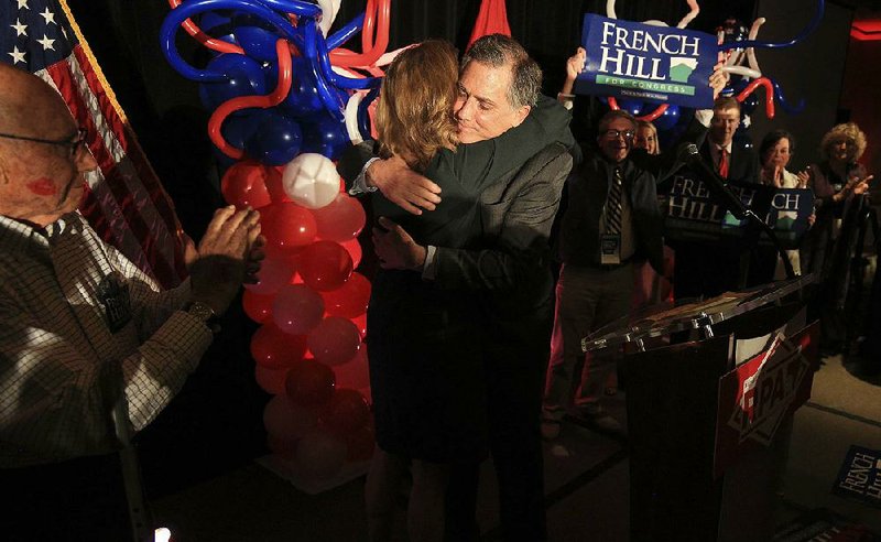 Arkansas Democrat-Gazette/STATON BREIDENTHAL --11/6/18-- Congressman French Hill hugs his wife Martha after speaking to supporters Tuesday night at a watch party in Little Rock. 