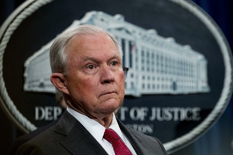 Attorney General Jeff Sessions attends a news conference to announce enforcement efforts against Cartel Jalisco Nueva Generacion, Tuesday, Oct. 16, 2018, at the Justice Department in Washington.