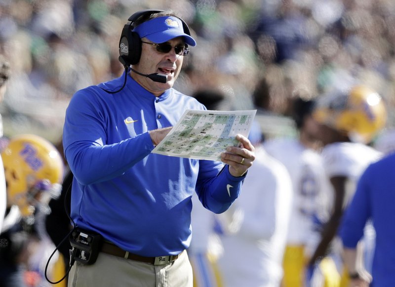 In this Oct. 13, 2018, file photo, Pittsburgh head coach Pat Narduzzi calls a play during the first half of an NCAA college football game against Notre Dame in South Bend, Ind. If first-place Pitt or second-place Virginia goes on to win the Coastal title this season, either would become the sixth different school in the last six seasons to win that side of the conference. (AP Photo/Darron Cummings, File)