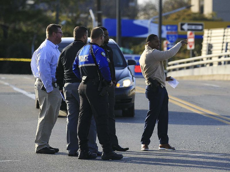 Little Rock police investigate a shooting Thursday afternoon on East Ninth Street at Interstate 30. One person was shot in the leg, and police said the injury was not considered life-threatening. 