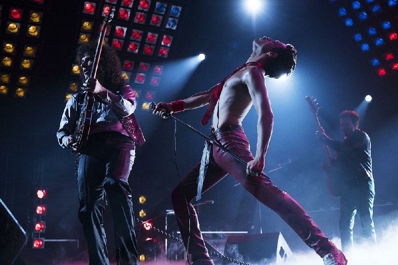 Gwilym Lee (left) stars as Brian May, Rami Malik plays Freddie Mercury and Joe Mazzello is John Deacon in 20th Century Fox’s Bohemian Rhapsody. The bio-pic came in first at last weekend’s box office and made about $50 million. 

