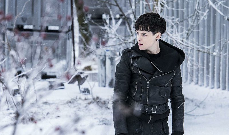 Lisbeth Salander (Clair Foy) is a superhero in a hacker’s uniform in The Girl in the Spider’s Web, the latest installment in the action franchise based on Swedish techno-thrillers.
