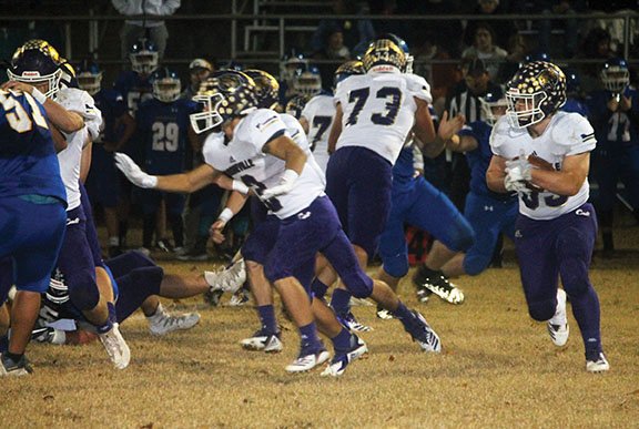 COURTESY PHOTO Carson Ray, Booneville senior running back, looks for an opening against Cedarville. The No. 1 Bearcats will host Baptist Prep in the first round of the Class 3A state playoffs Friday night.