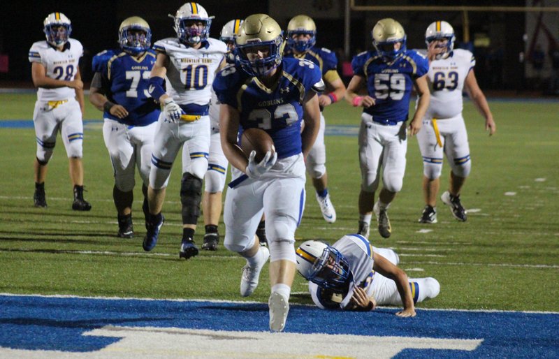 COURTESY PHOTO/Bobby Jones
Harrison junior Brooks Both runs into the end zone for a touchdown during the Goblins' 56-7 victory over Mountain Home on Aug. 31 at F.S. Garrison Stadium in Harrison. Both is usually the Goblins' fullback and is a blocker, but he's also their defensive captain and leading tackler as a linebacker.