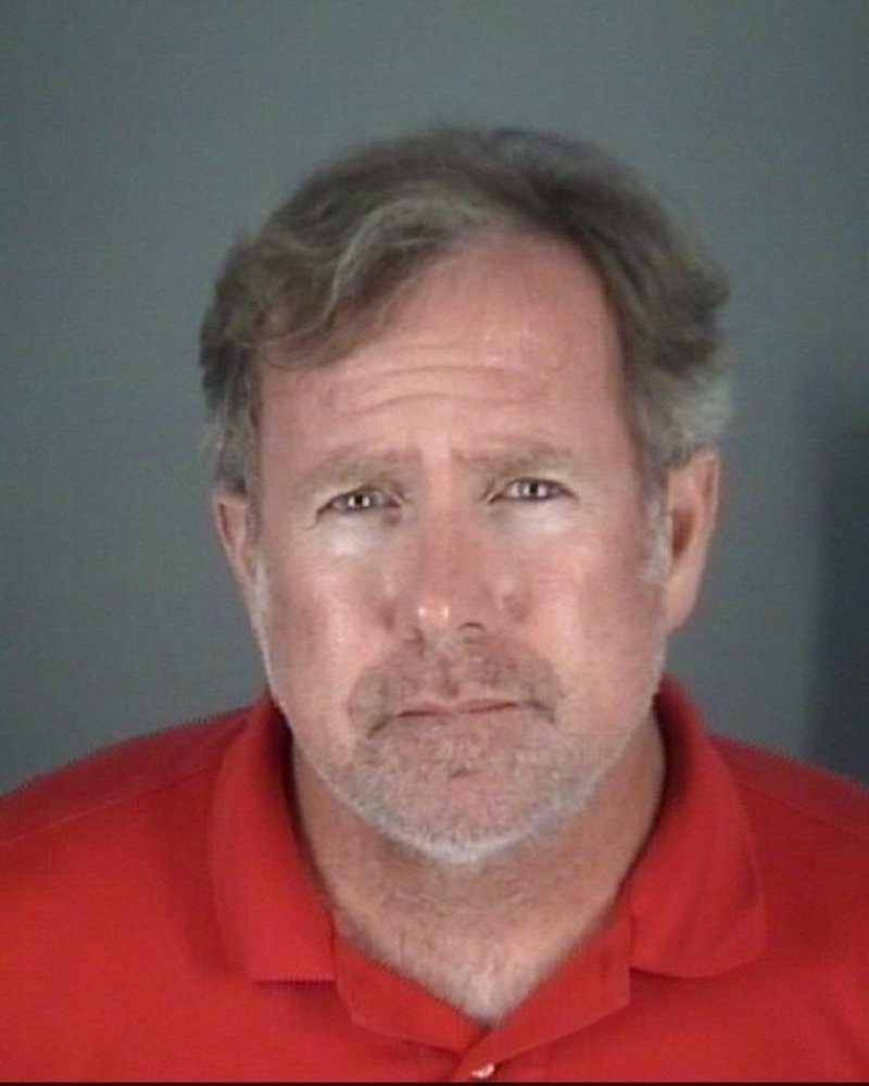 This photo provided by Pasco County Sheriff's Office shows Edward John Abernathy. Abernathy, a Florida elementary school principal is accused of stealing $900 from a mentally disabled 9-year-old. Abernathy was arrested Thursday, Nov. 8, 2018 and charged with grand theft. A Pasco County Sheriff's Office release says deputies were told the child brought $2,100 of his parents' money to Connerton Elementary School in Land O'Lakes in October. (Pasco County Sheriff's Office via AP)