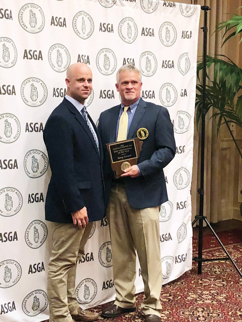 Brian Davis, South Central PGA Section executive director, left, presents the PGA Chapter Professional of the Year award to Barry Howard