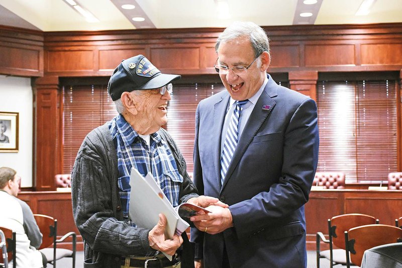 U.S. Sen. John Boozman, R-Ark., right, visits with World War II veteran Floyd Brantley. A resident of College Square Retirement Community in Conway, Brantley has been interviewed for the Library of Congress Veterans History Project.