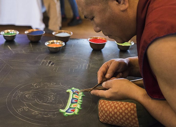 NWA Democrat-Gazette/CHARLIE KAIJO Monk Yeshi Topgyal designs a sand sculpture during a Creation of the Healing Mandala ceremony earlier this month in Eureka Springs. Topgyal and monk Geshe Thupten Dorjee of the Tibetan Cultural Institute of Arkansas will once again create a sand mandala beginning at 10 a.m. Monday at Mullins Library on the UA campus in Fayetteville. A Tibetan sand mandala is always ritualistically dismantled once it has been completed, symbolizing the Buddhist belief in impermanence. The closing ceremony will be at 4 p.m. Nov. 17. Information: 575-4104.