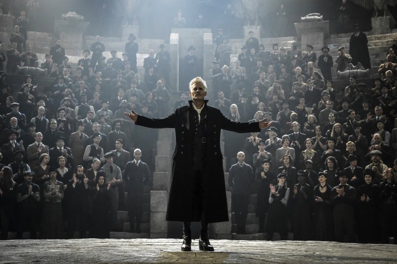 This image released by Warner Bros. Pictures shows Johnny Depp in a scene from &quot;Fantastic Beasts: The Crimes of Grindelwald.&quot; (Jaap Buitendijk/Warner Bros. Pictures via AP)