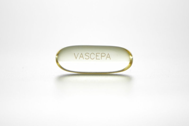 This undated photo provided by Amarin in November 2018 shows a capsule of the purified, prescription fish oil Vascepa. Although fish oil taken by healthy people, at a dose found in many supplements, showed no clear ability to lower heart or cancer risks, higher amounts of a purified, prescription fish oil, such as Vascepa, slashed heart problems and heart-related deaths among people with high triglycerides, a type of fat in the blood, and other risks for heart disease. (Amarin via AP)