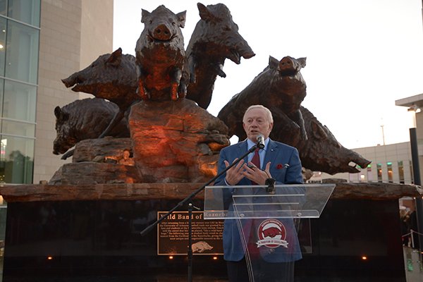 Dallas Cowboys owner Jerry Jones, a former Arkansas football player, speaks during the dedication of the Wild Band of Razorbacks monument Saturday, Nov. 10, 2018, in Fayetteville. 