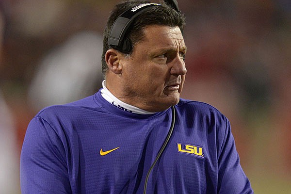 LSU coach Ed Orgeron watches from the sidelines during the third quarter of a football game against Arkansas on Saturday, Nov. 10, 2018, in Fayetteville. 