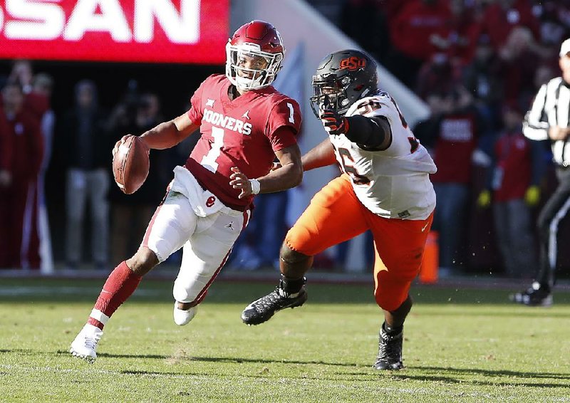 Oklahoma quarterback Kyler Murray (1) passed for 349 yards and rushed for 66 as No. 6 Oklahoma defeated Oklahoma State 48-47 on Saturday in Norman, Okla. 
