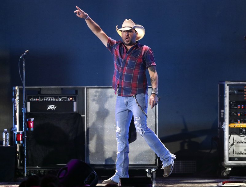 FILE - In this Sept. 21, 2018 file photo, Jason Aldean performs at the 2018 iHeartRadio Music Festival in Las Vegas. (Photo by John Salangsang/Invision/AP, File)