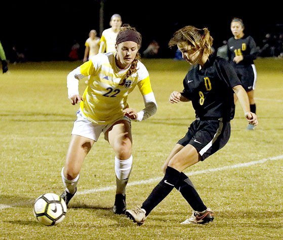 Photo submitted John Brown's Melody Hagen, left, goes against Science and Arts' Jillian Nicholas during Thursday's Sooner Athletic Conference Championship match in Chickasha, Okla. The Drovers defeated the Golden Eagles 2-0 to win the conference title and an automatic NAIA National Tournament berth.