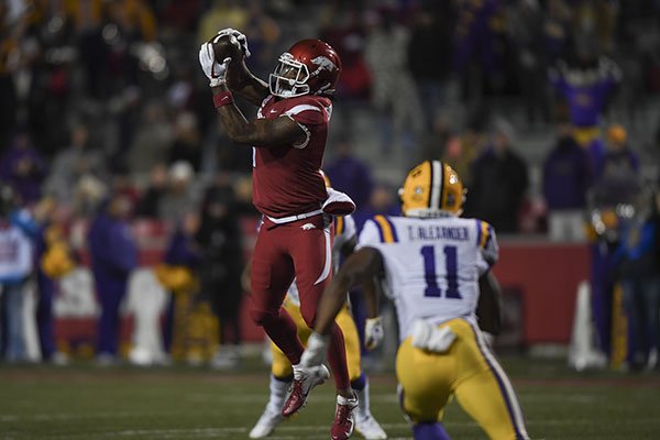 Arkansas receiver Jared Cornelius catches a pass during a game against LSU on Saturday, Nov. 10, 2018, in Fayetteville. 