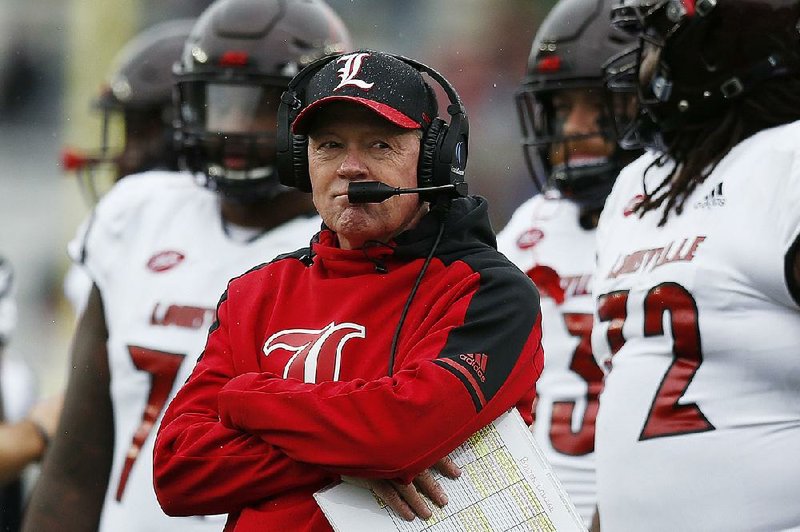 Louisville coach Bobby Petrino was fired Sunday after the Cardinals fell to 2-8 with a 54-23 loss at No. 12 Syracuse on Friday night. Petrino, a former University of Arkansas coach, departs with a 77-35 mark in two stints with Louisville.
