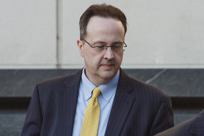 FILE - In this Tuesday, Oct. 2, 2018 file photo, West Virginia Supreme Court Justice Allen Loughry leaves the Robert C. Byrd United States Courthouse in Charleston, W.Va. after a federal jury was selected for his criminal trial. On Saturday, Nov. 10, 2018, the office of Gov. Jim Justice said that he has accepted the resignation of the suspended state Supreme Court justice recently convicted of federal charges, days ahead of a legislative session set to consider the justice&#x2019;s removal amid an ongoing scandal involving the court. (Craig Hudson/The Charleston Gazette-Mail via AP)