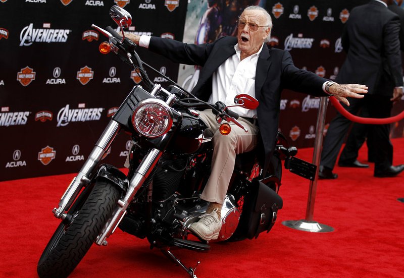 FILE - In this April 11, 2012, file photo,Stan Lee arrives at the premiere of "The Avengers" in Los Angeles. Comic book genius Lee, the architect of the contemporary comic book, has died. He was 95. The creative dynamo who revolutionized the comics by introducing human frailties in superheroes such as Spider-Man, The Fantastic Four and The Incredible Hulk, was declared dead Monday, Nov. 12, 2018, at Cedars-Sinai Medical Center in Los Angeles, according to Kirk Schenck, an attorney for Lee's daughter, J.C. Lee. (AP Photo/Matt Sayles, File)