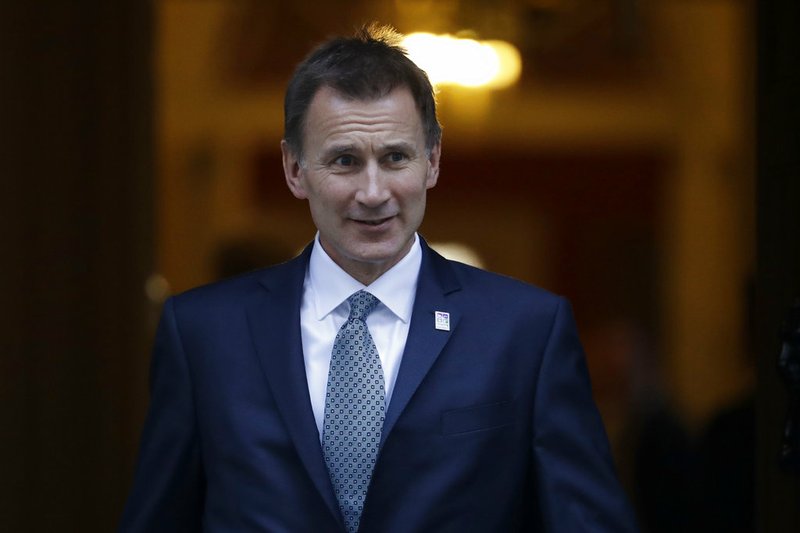 Britain's Foreign Secretary Jeremy Hunt leaves after a cabinet meeting at 10 Downing Street in London, Tuesday, Nov. 13, 2018. (AP Photo/Matt Dunham)