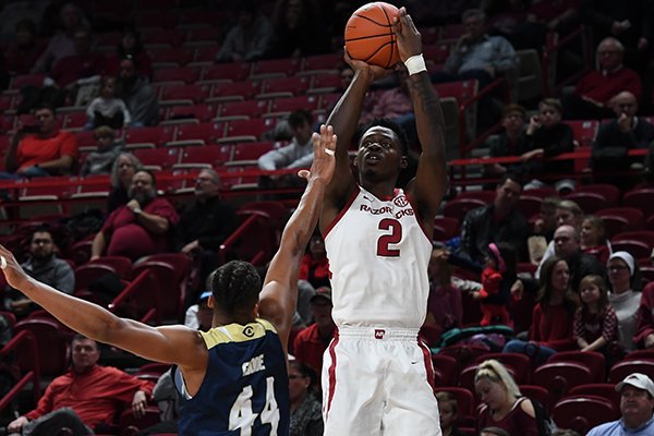 Arkansas forward Adrio Bailey shoots the ball during a game against UC Davis on Monday, Nov. 12, 2018, in Fayetteville. 