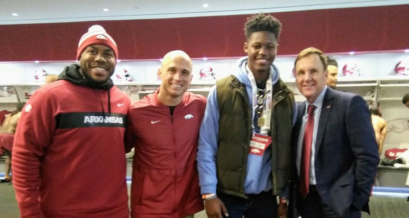 Strength assistant Chad Cain, receivers coach Justin Stepp, 2020 receiver target Ze'Vian Capers and Coach Chad Morris. 