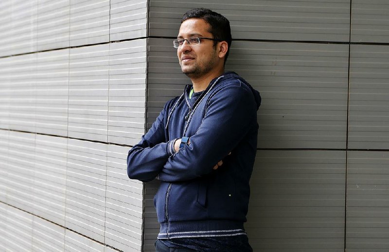 In this July 7, 2017, file photo, Flipkart Group Chief Executive Officer and co-founder Binny Bansal poses during a photo call at the company's headquarters in Bangalore, India. Bansal, the co-founder of Flipkart, the massive online retail operation in India acquired by Walmart this year, is stepping down following an allegation of serious personal misconduct. 