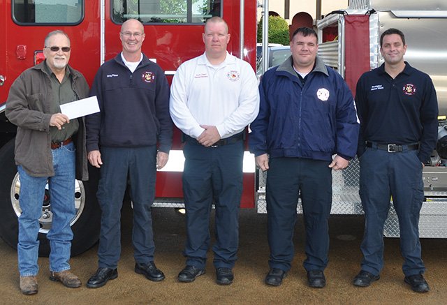 Pictured left to right: Dr. Mark Bryan, Columbia County Conservation District Board President, Greg Pinner, Magnolia Fire Department Fire Chief, Randal Stevens, Assistant Chief, David Reeves, and James Dixon.