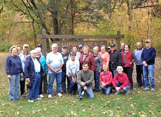 Photo submitted Twenty-four members and guests of the Bella Vista Traveling Sams held their annual cleanup at Devil's Den State Park. Some of the cleaning up included cleaning fire pits and painting hand railings.