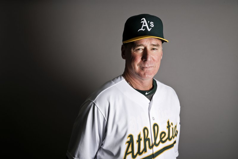 In this Wednesday, Feb. 22, 2017 file photo, Oakland Athletics manager Bob Melvin poses for a portrait in Mesa, Ariz. 