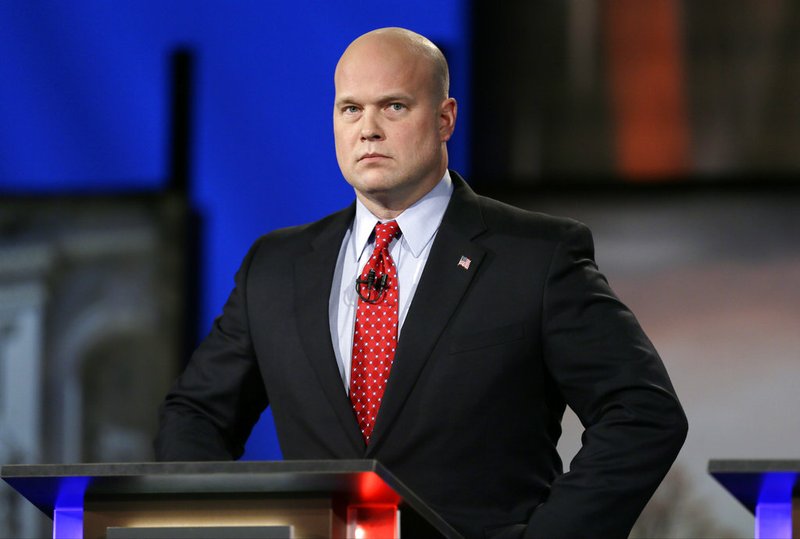 FILE - In this April 24, 2014, file photo, then-Iowa Republican senatorial candidate and former U.S. Attorney Matt Whitaker watches before a live televised debate in Johnston, Iowa. Maryland is challenging the appointment of Matthew Whitaker as the new U.S. acting attorney general. A draft filing obtained Tuesday by The Associated Press argues that President Donald Trump sidestepped the Constitution and normal procedure by naming Whitaker to the position in place of Deputy Attorney General Rod Rosenstein. (AP Photo/Charlie Neibergall, File)