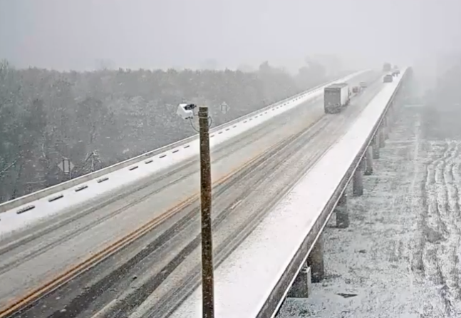 Snow falls on the White River bridge in Augusta on Wednesday afternoon. Photo by Arkansas Department of Transportation.