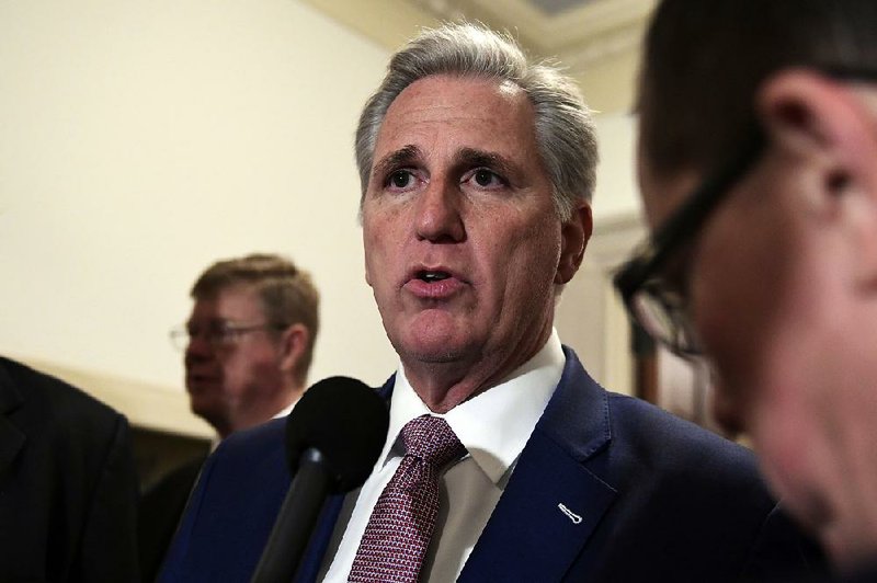 House Majority Leader Kevin McCarthy of Calif., speaks to reporters as he arrives for a meeting on Capitol Hill in Washington, Wednesday, Nov. 14, 2018, for the House Republican leadership elections. 