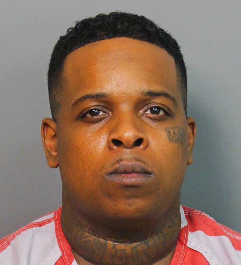 FILE- This July 2, 2017, file photo provided by the Jefferson County Sheriff's office in Pine Bluff, Ark., shows Ricky Hampton, also known as Finese2Tymes. Hampton, a Tennessee rapper no longer wants to withdraw his guilty plea from a weapons charge that was filed after he was arrested with a gun following a shooting at a Little Rock nightclub that left 25 people injured last year. Hampton told a federal judge Wednesday, Nov. 14, 2018, that he accepts "full responsibility" after admitting earlier this year he possessed a gun at an eastern Arkansas night club a week before the Little Rock shooting. (Jefferson County Sheriff's Office via AP, File)